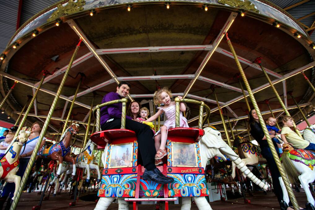 "I bags the elephant!". Canberra's much-loved merry-go-round is back in action. Picture: Katherine Griffiths