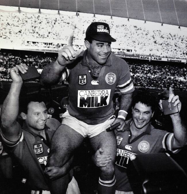 Daley and Bradley Clyde chair Mal Meninga off after the 1994 grand final demolition of Canterbury.