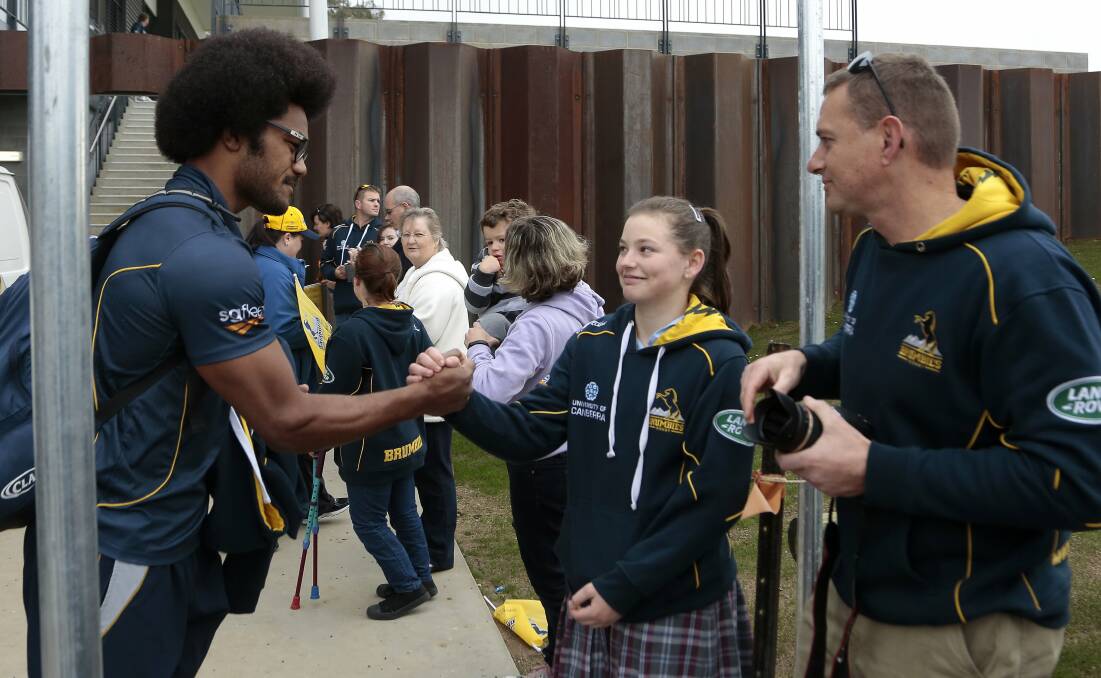 Man of the people: Henry Speight meets fans before the 2014 Super Rugby semi-final. Picture: Jeffrey Chan.