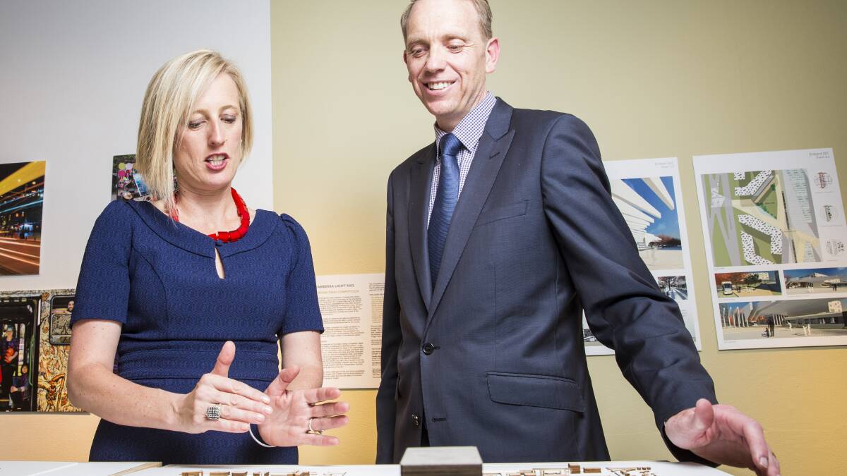 Chief Minister Katy Gallagher and Capital Metro Minister Simon Corbell at the light rail business case launch in 2014.