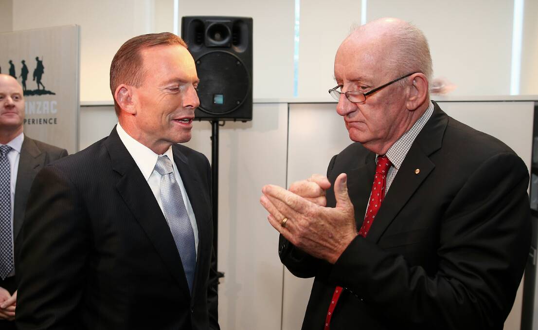 Then prime minister Tony Abbott (left) with former deputy prime minister Tim Fischer in 2015. Picture: Alex Ellinghausen