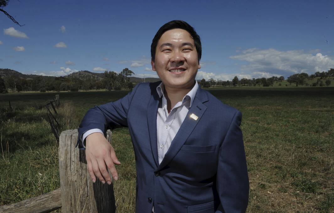 Moaneng vice-president Qiao Han was surprised to learn a proposed realignment of the Monaro Highway would run through his solar farm. Photo: Graham Tidy