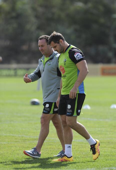 Raiders coach Ricky Stuart, left, has talked with halfback Aidan Sezer about his future. Picture: Graham Tidy