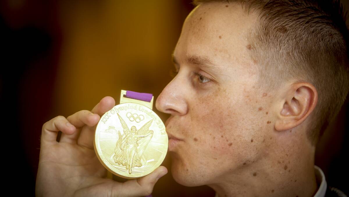 Jared Tallent finally got his hands on a gold medal for the 50km walk for the 2012 London Olympics - four years later. Picture: Eddie Jim.