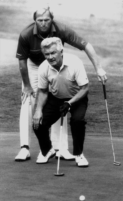 Prime Minister Bob Hawke and golfing legend Greg Norman at the Royal Canberra Golf Club in 1988.