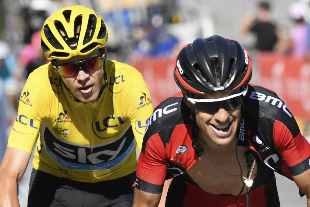 Britain's Chris Froome, wearing the overall leader's yellow jersey and Australia's Richie Porte, compete in the Tour de France in 2016. Picture: AP