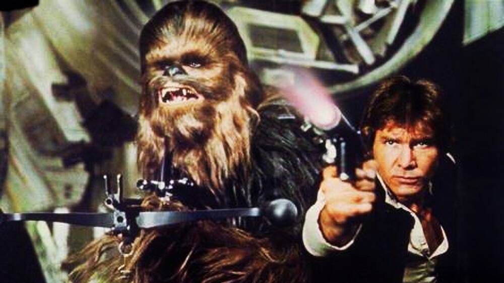Peter Mayhew as Chewbacca, left, and Harrison Ford as Hans Solo in Star Wars: Episode IV - A New Hope. Picture: Twentieth Century Fox Home Entertainment via AP
