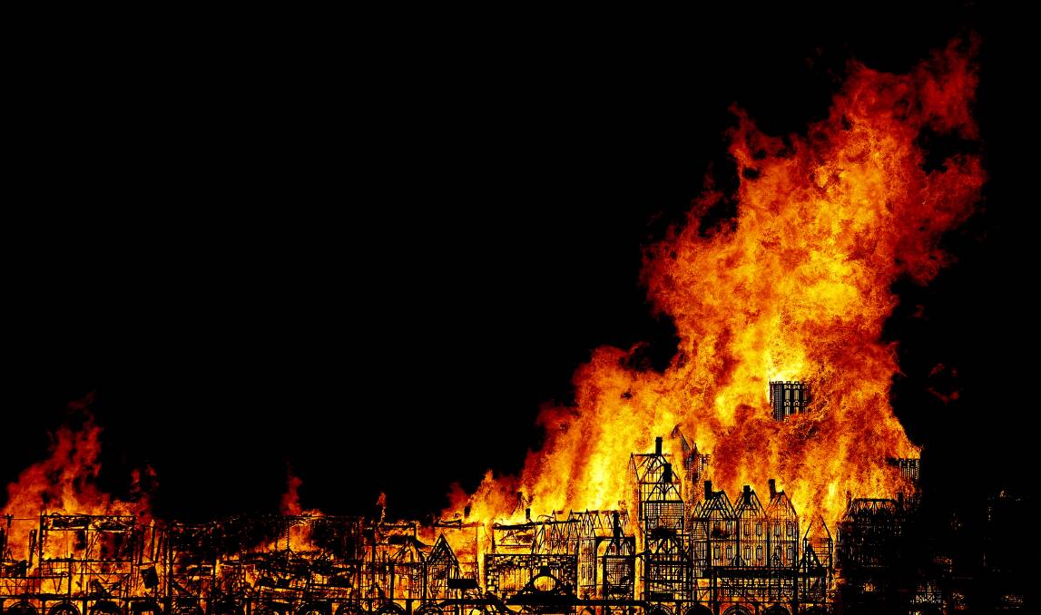 A 120-metre long sculpture of the 17th-century London skyline is set alight in a retelling of the story of the Great Fire of London in 1666, in London, 2016. PIcture: AP/Frank Augstein