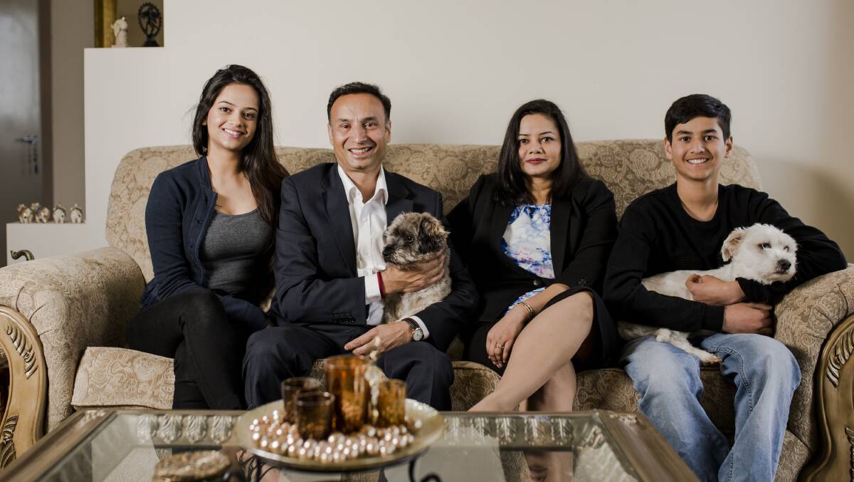 Labor's Deepak-Raj Gupta with his family, from left, daughter Mallika Raj, wife Shuchi Raj and son Ashvin Raj, plus their dogs Sky and Tank, photographed in 2016. Picture: Jamila Toderas
