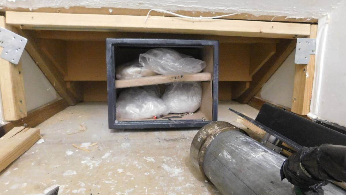 Freezer bags containing ice and heroin, which were found behind a false wall in Christopher French's former Palmerston home. Picture: ACT Policing