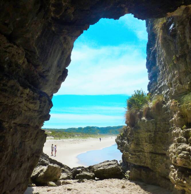 Peering out of the large cavern at Booderees Cave Beach. Picture: Tim the Yowie Man
