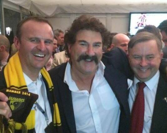Andrew Barr at the 2014 grand final with Hawthorn legend Robert Dipierdomenico and Labor MP Anthony Albanese.