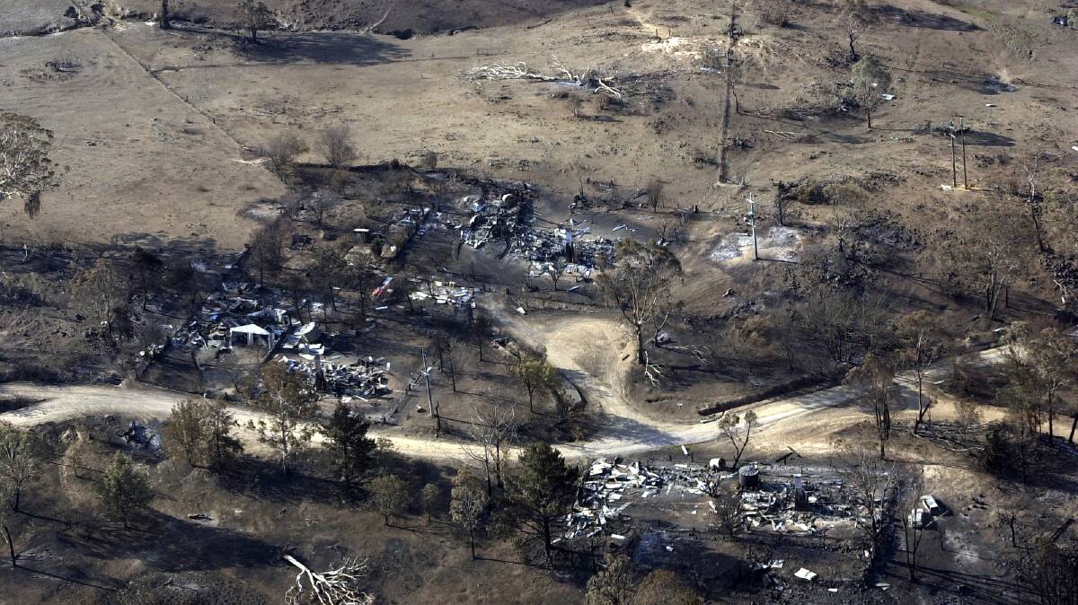 Pierce's Creek Forestry Settlement after the 2003 bushfires. Picture: Graham Tidy.
