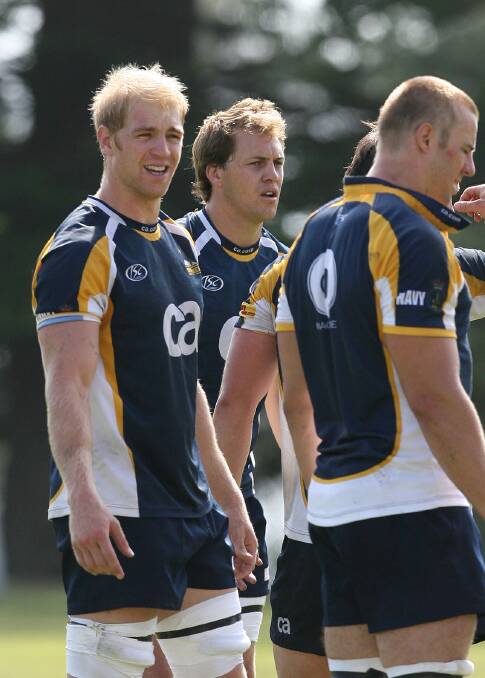 Shawn Mackay, left, with Stephen Hoiles at Brumbies training. Picture: Andrew Sheargold