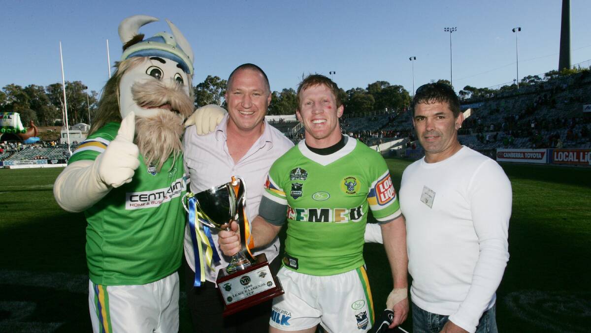 O'Sullivan, right, with Victor the Viking, fellow '89 premiership player Steve Jackson and Alan Tongue. Photo: Andrew Sheargold
