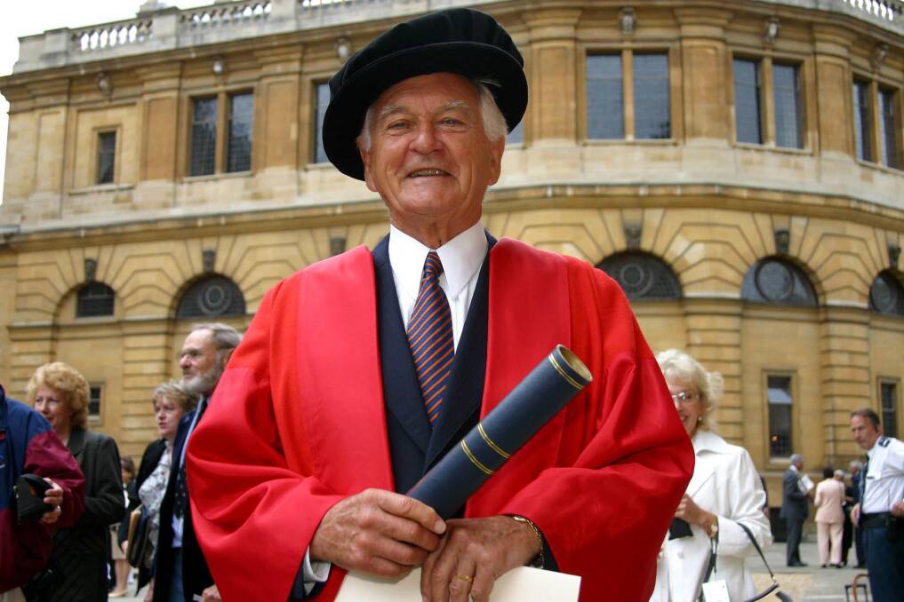 Former prime minister Bob Hawke with his honorary degree in front of the Sheldonian Theatre, Oxford. Picture: AP
