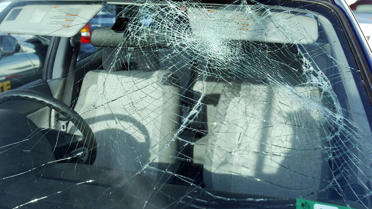 This Subaru windscreen was smashed in a Canberra road rage incident, and the victim was a hospital worker carrying medication. Picture: Bob Givens
