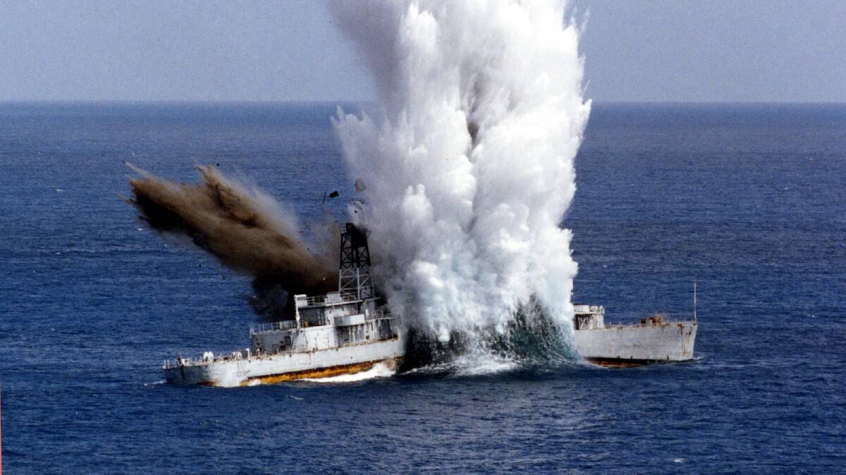 A decommissioned Taiwanese Navy ship anchored off shore explodes after a U.S.-made MK48 torpedo hit launched by a Sea Dragon submarine during an exercise in Pingtung, 320 kilometers southwest of Taipei. Taiwan's armed forces often conduct exercise as China has threatened to use its massive military to force Taiwan to unify. A civil war separated the two sides in 1949. Picture: Taiwan Navy.