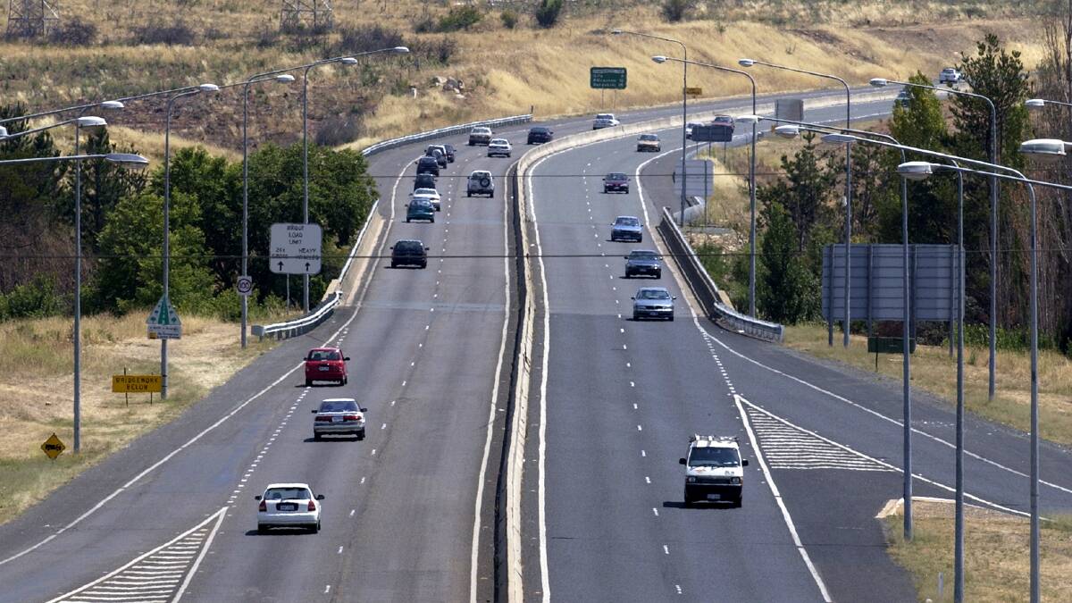 Chevrons are being painted on the Tuggeranong Parkway, as part of a move to cut down on tailgating in the ACT. Picture: Graham Tidy
