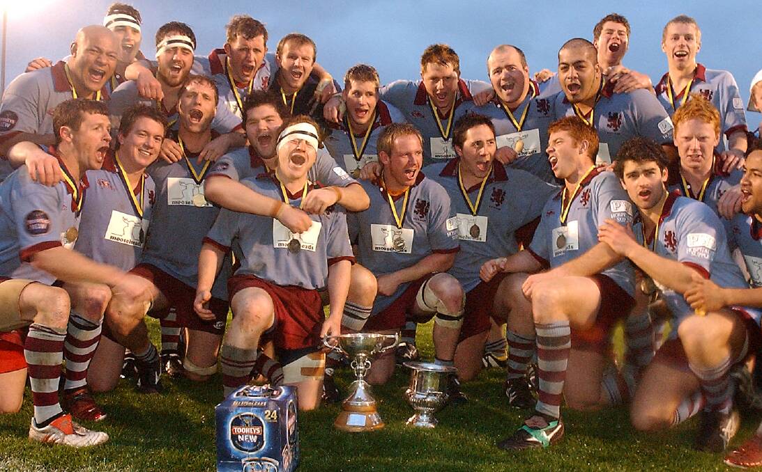 Wests coach Craig Robberds, front with head strapped, and Peter Kimlin, middle-row right, played together in the 2005 premiership-winning side. Picture: Martin Jones