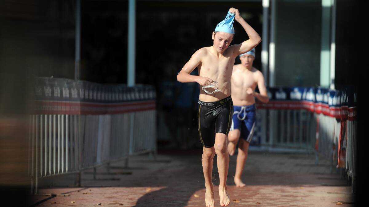 Children participate in a past TRYathlon in Canberra. Picture: Karleen Minney