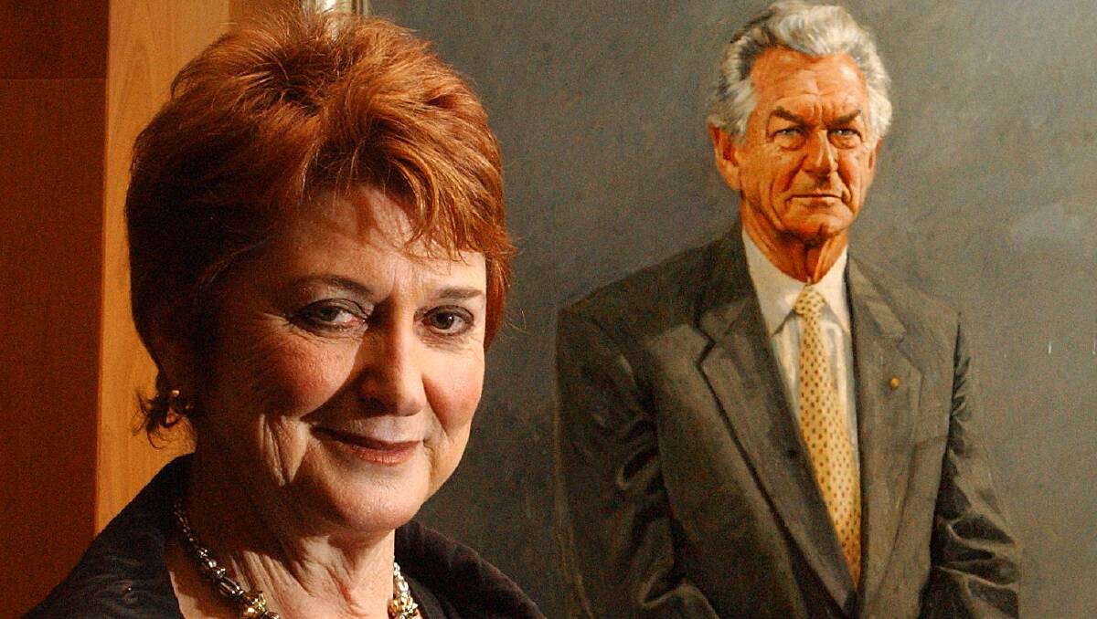 Susan Ryan with the official prime ministerial portrait of Bob Hawke, with whom she served in government in the 1980s. Picture: Gary Schafer