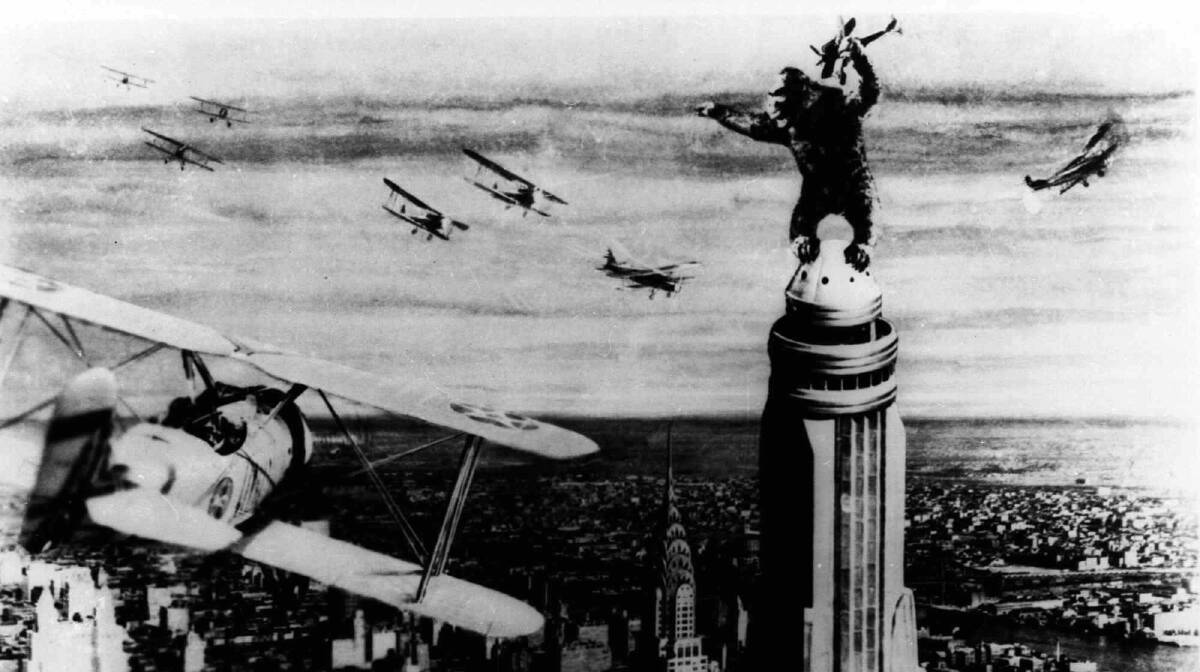 The stop-motion King Kong attempts to ward off an attack by fighter planes in King Kong (1933). Picture: AP