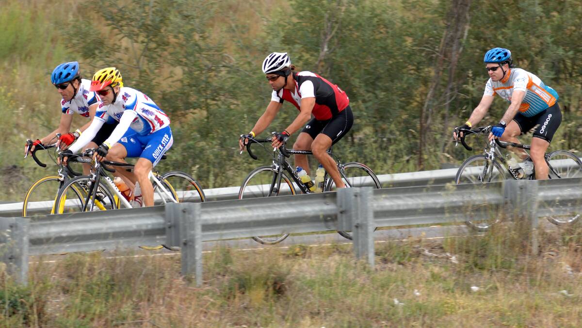 Riders in the Fitz's Challenge make their way along Uriarra Road in the 2007 event. Picture: Graham Tidy