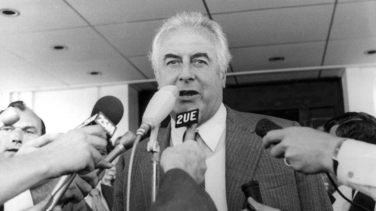 Gough Whitlam's historic appearance on the steps of Old Parliament House after being dismissed in November 1975. Picture: Graham Thompson