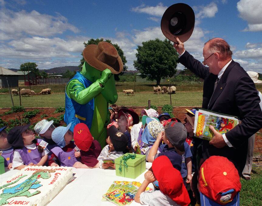 Tim Fischer mixes it with the kids in Fyshwick at the launch of a child safety book in 1999. Picture: Martin Jones.