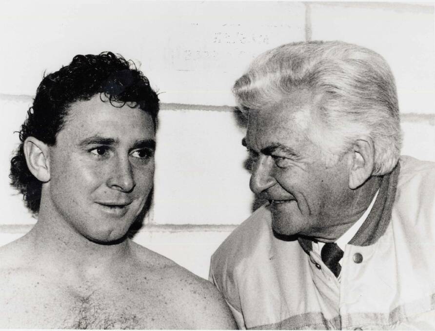 Then-Raiders halfback Ricky Stuart and Bob Hawke share a beer in the change room. Picture: Research Centre, Old Parliament House.