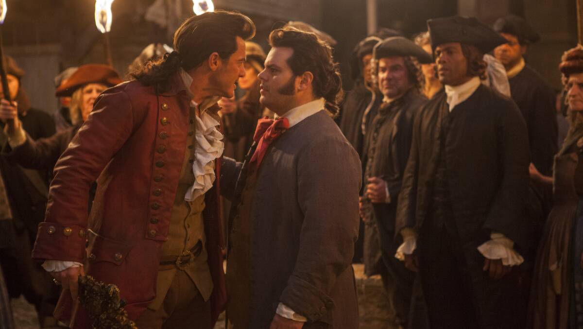 Luke Evans, left, as Gaston and Josh Gad as LeFou in 'Beauty and the Beast'. Picture: Laurie Sparham/Disney