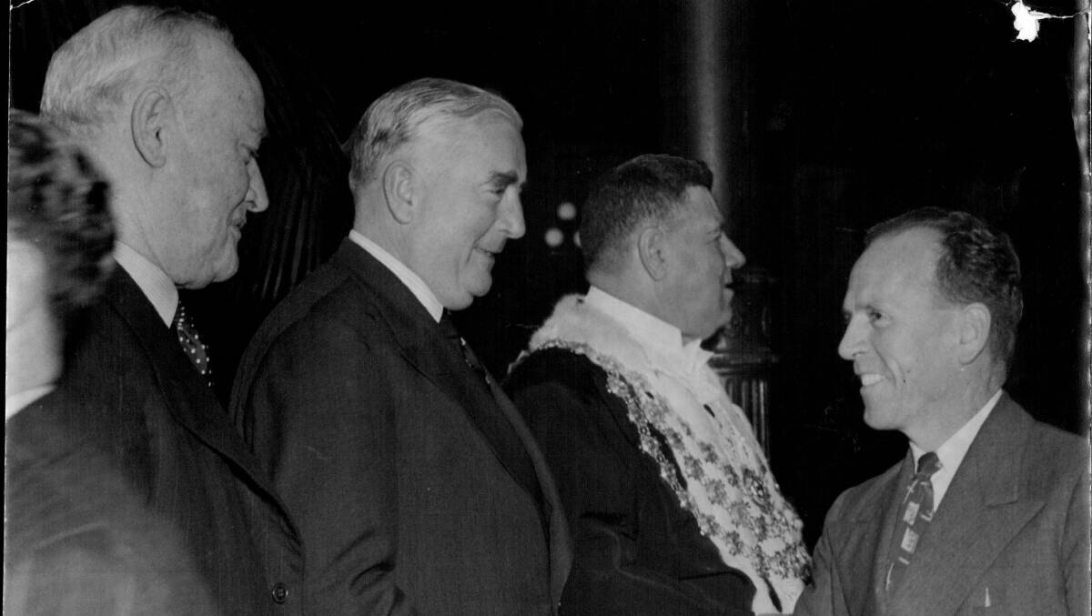 A meeting between Robert Menzies and H.C. "Nugget" Coombs, then governor of the Commonwealth Bank, in 1950. Picture: Fairfax Media