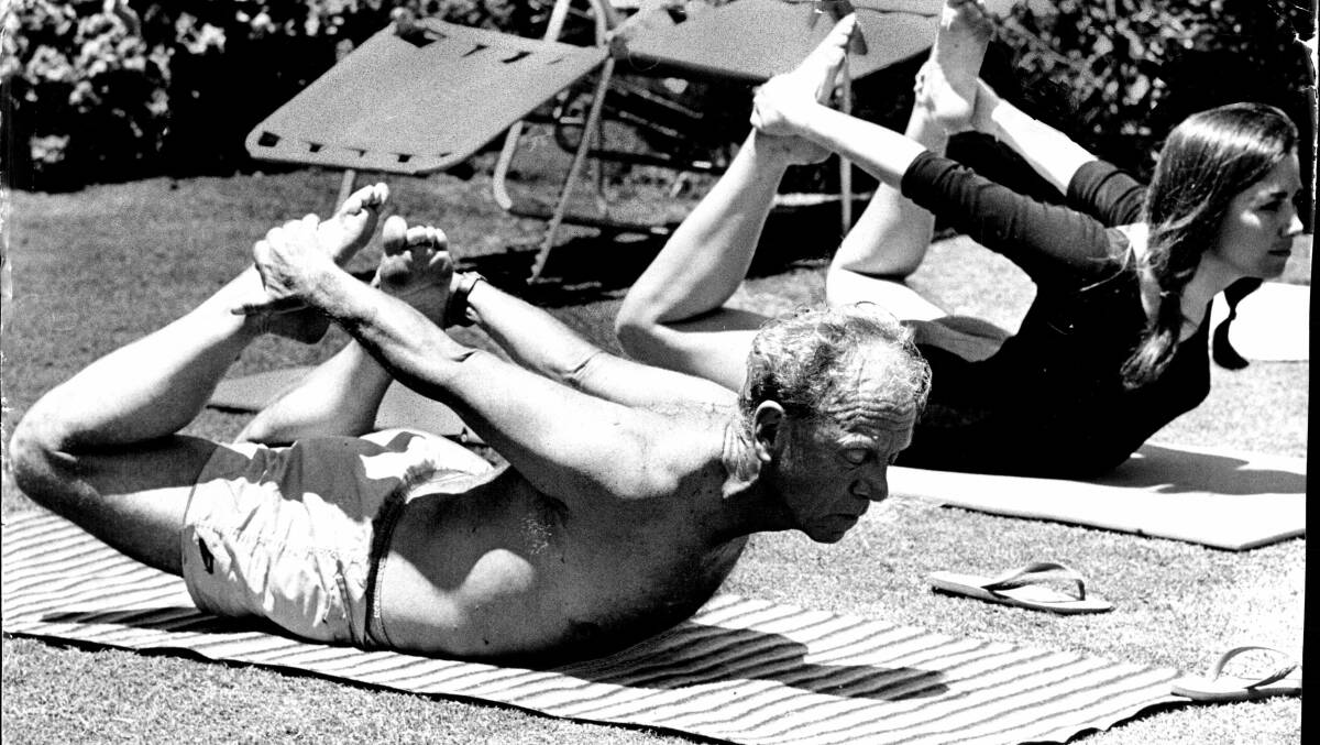 H.C. "Nugget" Coombs, here in a yoga pose in 1967, was one of the many mandarins who worked under Labor but continued to lead the bureaucracy after Robert Menzies became prime minister. Picture: Fairfax Media