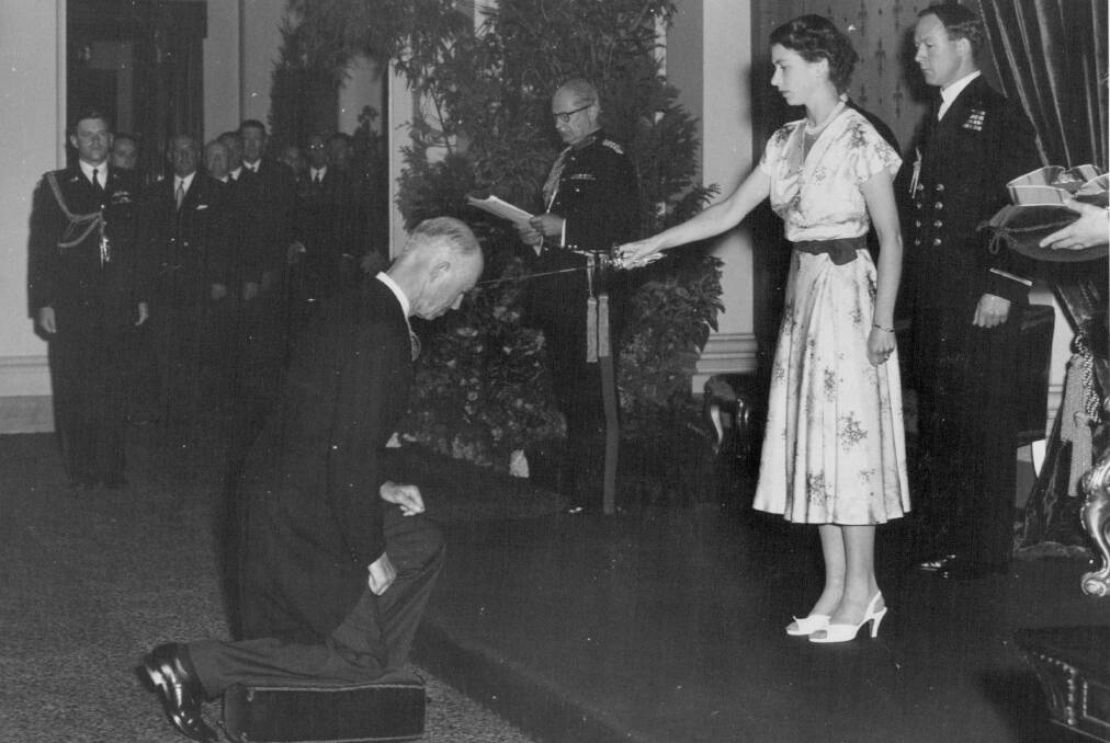 Director general of aviation, Air Marshall Sir Richard Williams stayed at the Kingston Hotel during the Royal visit in February, 1954. He is pictured receiving his knighthood from Queen Elizabeth II in Melbourne on March 9, 1954.