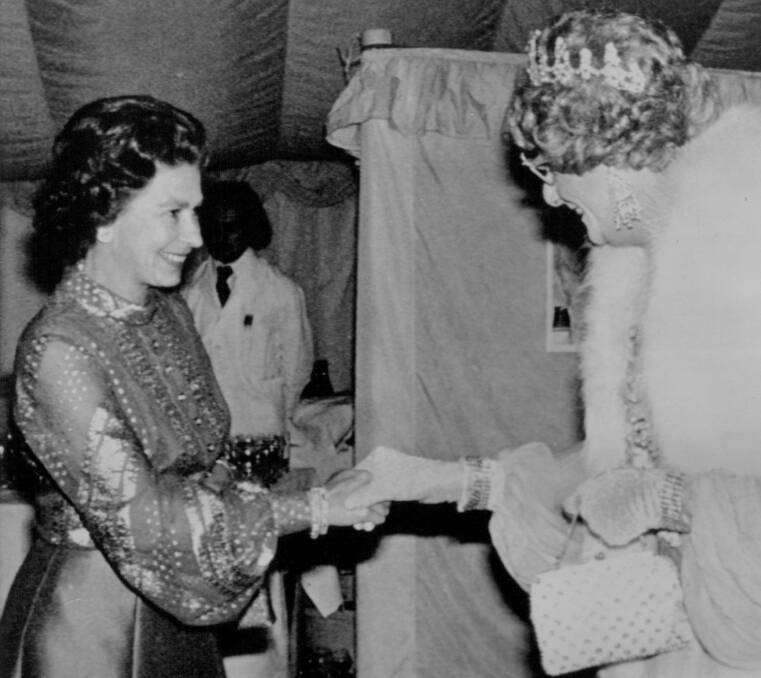 Queen Elizabeth meets Dame Edna Everage in 1977. Picture: AP