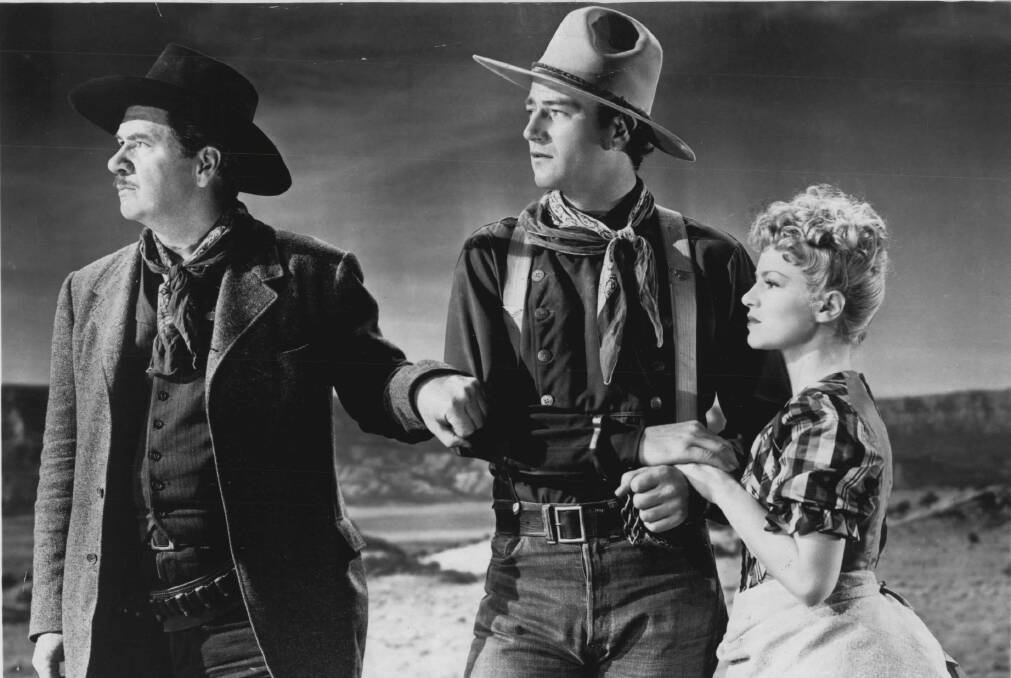 Geo Bancroft, John Wayne and Claire Trevor in Stagecoach. Picture: Supplied