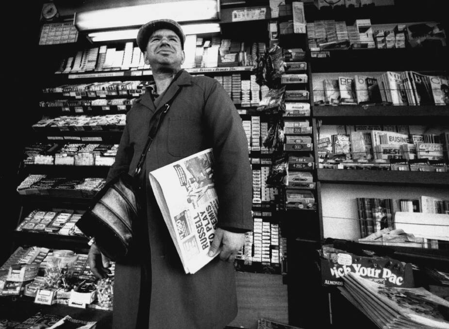 A paper seller in 1989. The internet has disrupted the traditional mass media model. Picture: Jack Vincent Picone