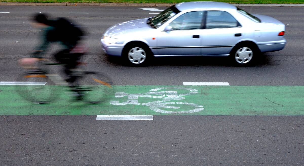 Cyclists on roads must use available cycle lanes unless it is 'impracticable' to do so. Picture: Marina Neil