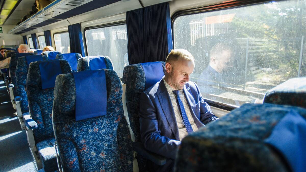 ACT Chief Minister Andrew Barr boards a train to Sydney to push for a faster rail service between Canberra and the NSW capital. Photo: Sitthixay Ditthavong