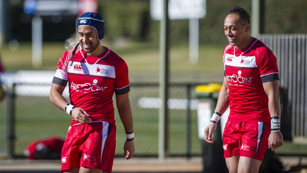 Lix Lealiifano and his brother Christian Lealiifano walking to the field in 2017. Picture: Dion Georgopoulos