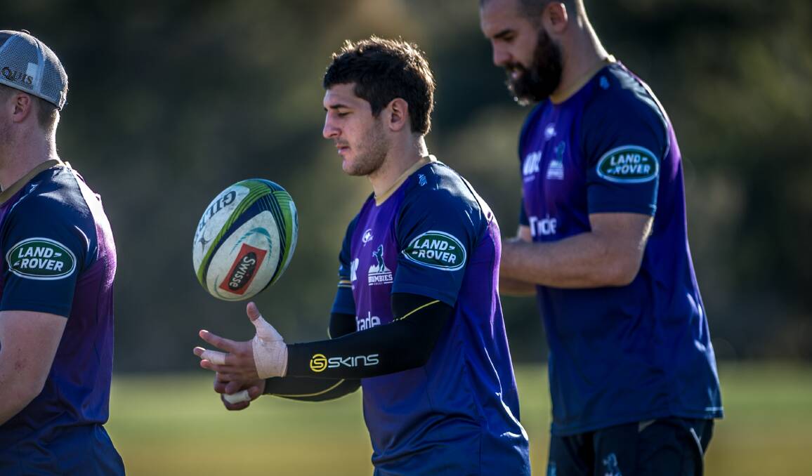 Tomas Cubelli, centre, was a Brumbies star in his two-year Canberra stint. Picture: Karleen Minney