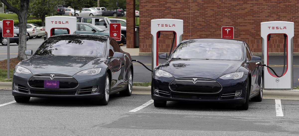 We should be heavily promoting electric vehicles so we can reduce the $30 billion a year petroleum import bill. Picture: AP