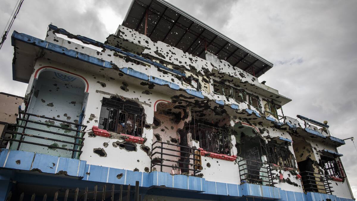 The apartment block that was the site of the first clash between members of the Maute group and the military in 2017. Picture: Sitthixay Ditthavong