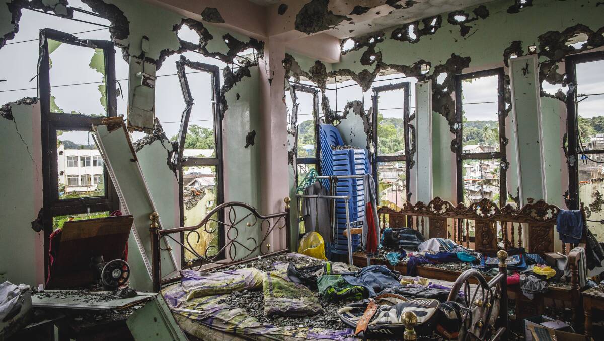 Remnants of an apartment block in Barangay Basak where the Marawi conflict began with a fierce firefight between members of the Maute group and elements of the 103rd brigade on May 23rd. Picture: Sitthixay Ditthavong