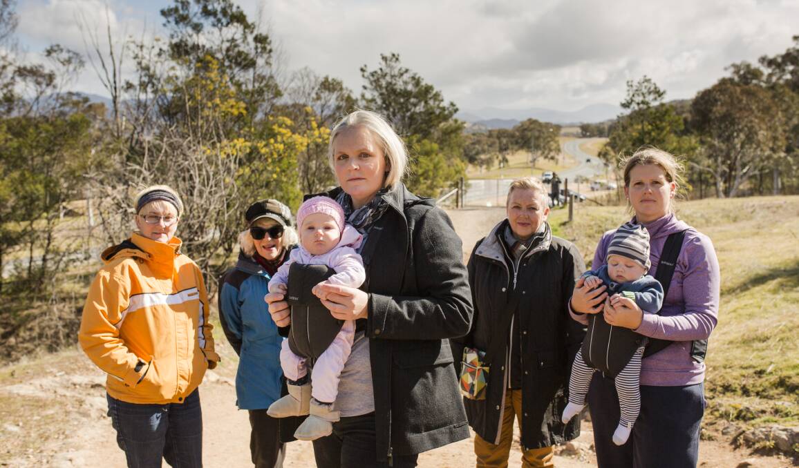 Concerned Kambah residents in 2017, including Taryn Langdon, front, raised concerns about the safety of Mount Taylor facilities. Picture: Jamila Toderas.