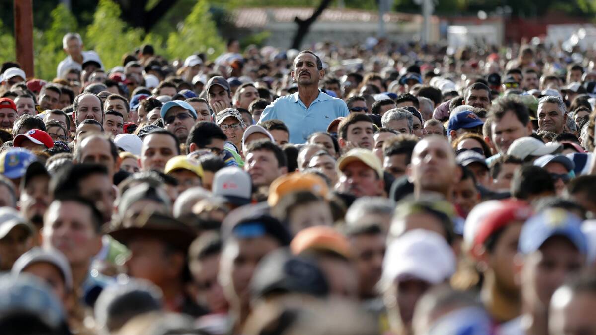 Thousands of Venezuelan refugees have streamed across the border to Colombia. Picture: AP
