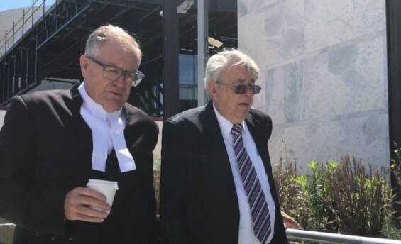 Garry Leslie Marsh (right) leaving the ACT Supreme Court after a previous appearance with his lawyer Greg Walsh. Picture: Supplied