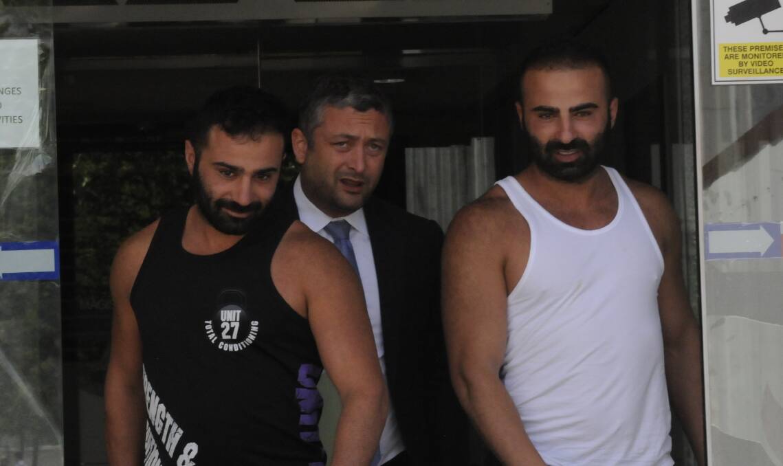 Adam Jabal, left, and Youssef Jabal, right, leave the ACT Magistrates Court in 2017 with lawyer Kamy Saeedi.