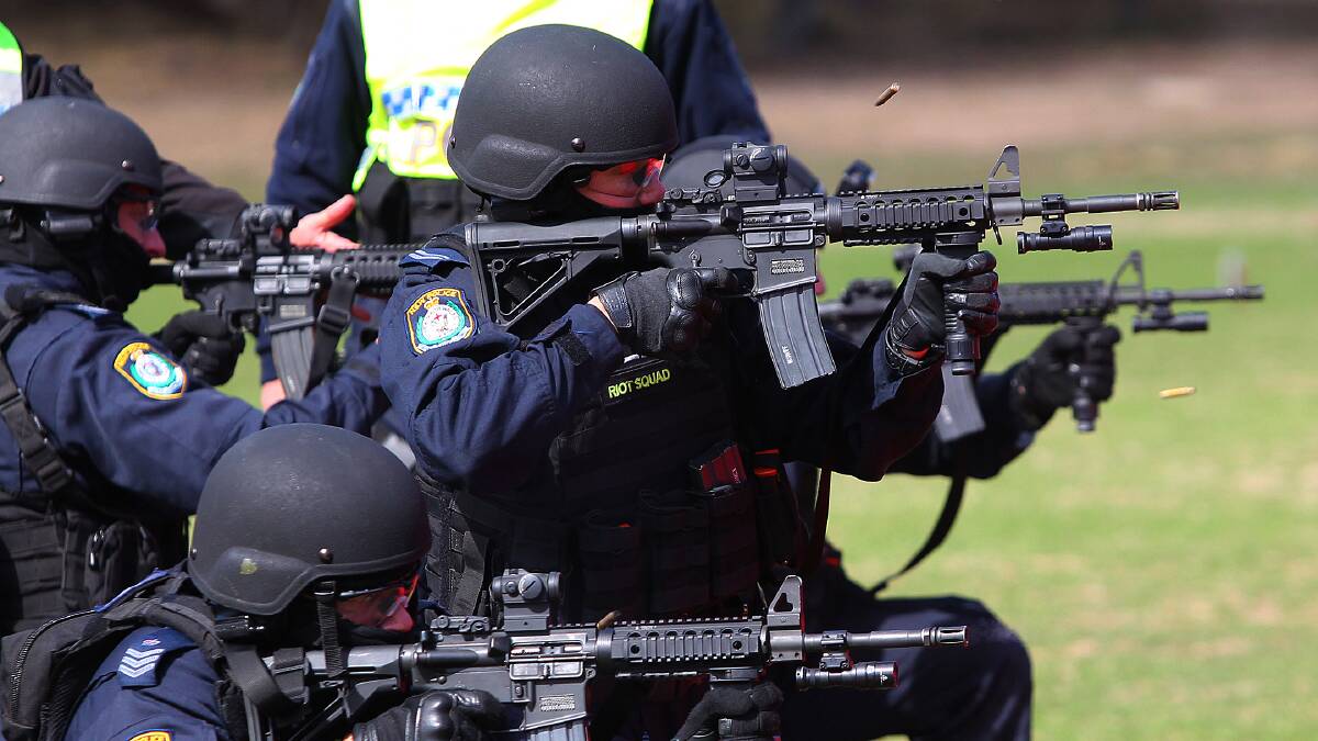 NSW Public Order and Riot Squad officers undergo training with semi-automatic rifles at the shooting range site near Collector. Picture: Matt Jewell